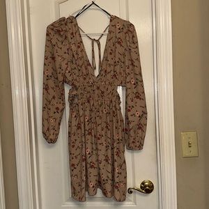 Medium sized Flower patterned Forever 21 dress with open sides and back